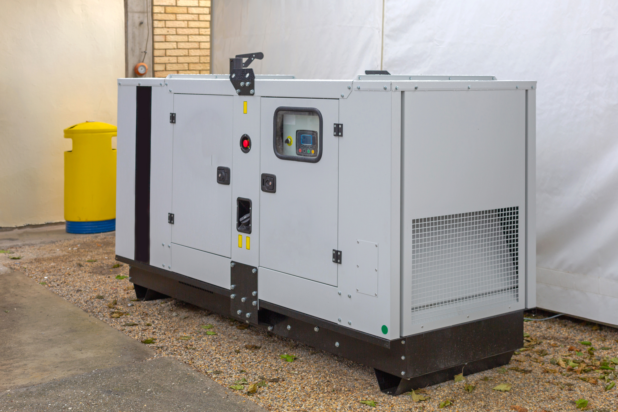 Standby generator installed outside a home, ready to provide backup power during an outage